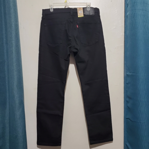 Levi's 502 Taper Jeans. Black 33x30 - Picture 2 of 2
